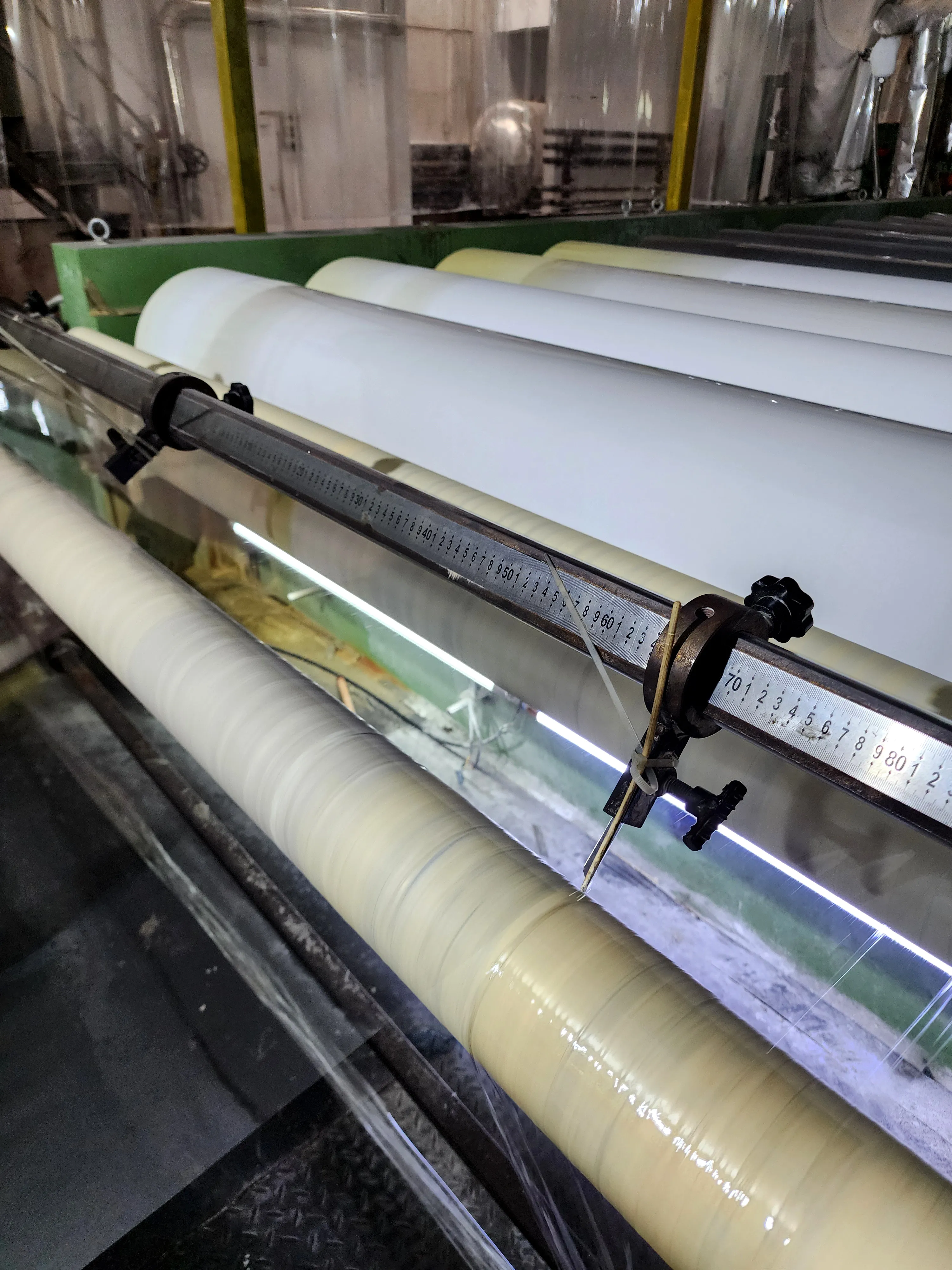 Calendering detail — film moving through the rollers